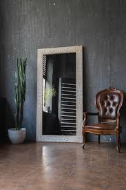 Stylish Mirror On A Gray Wall Background