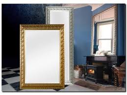 Bevelled Mirror In A Ornated Frame