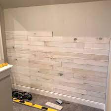 An Accent Wall Using White Washed Boards