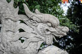 Premium Photo Stone Dragon Sculpture