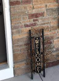 How To Hang A Decorative Sign On Brick