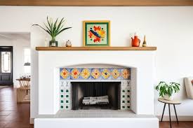 White Stucco Fireplace With Decorative