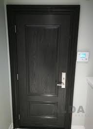 Black Entry Door With Oak Grain Texture