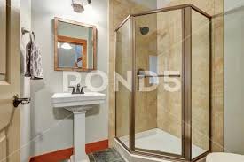 Glass Shower With Beige Tile Wall Trim