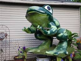 Pressman Frog Leaps From Rooftop Perch