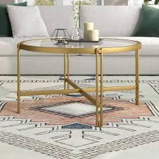 Inez 32 Wide Round Coffee Table In Brass