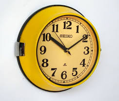 Yellow Metal Wall Clocks For