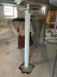 New Post Pier Supports Sagging Floor In