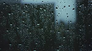 Rainy Day Behind Blur Window Glass