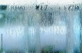 Rain Outside Window On Rainy Summer
