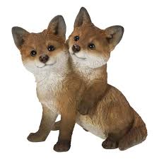 Fox Pups Hugging Statues