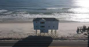 Bizarre Beach House On Stilts For