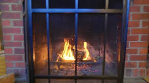 Wood Fire In Brick Fireplace In Old