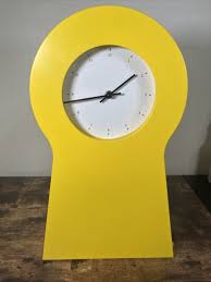 Yellow Metal Wall Clocks For