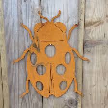 Rusty Ladybird Wall Plaque Garden Art