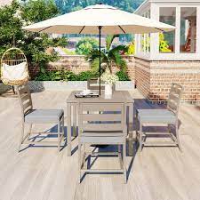 Polibi Brown 5 Piece Acacia Wood Outdoor Dining Table And Chairs With Gray Cushions