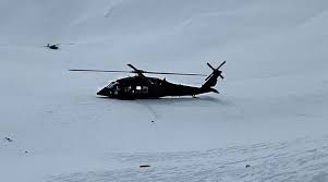 helicopter crashes into remote alaska lake