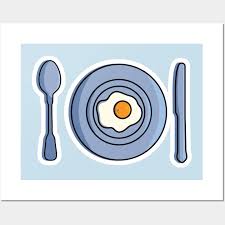 Fried Egg In Plate With Spoon And Knife