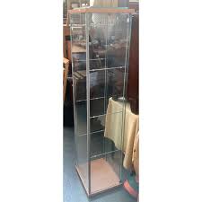 An Ikea Detolf Display Cabinet With
