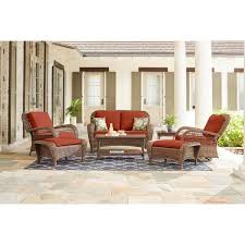 Beacon Park Brown Wicker Outdoor Patio Loveseat With Cushionguard Quarry Red Cushions