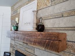 diy fireplace mantel from a barn beam