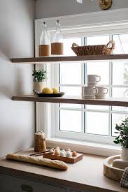 Shelves In Front Of Kitchen Window