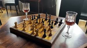 Chessboard With Pieces On An Antique
