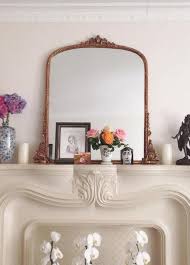 Gleaming Primrose Mirror On Fireplace