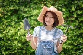 Premium Photo An Asian Woman Gardener