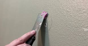Slow Motion Fixing Drywall Hole With