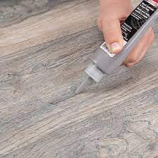 Gray Wood Laminate And Vinyl Putty