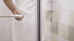 Woman Open The Glass Door In The Shower