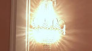 Glowing Crystal Sconce Hanging On Wall