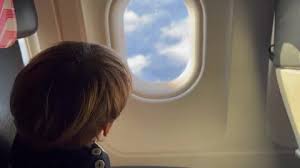 Child Traveling By Plane Little Boy