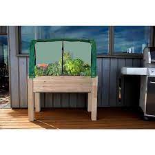 Cedarcraft Beautiful Functional Sustainable 23 In X 49 In X 30 In Self Watering Cedar Planter Greenhouse And Bug Cover Tan