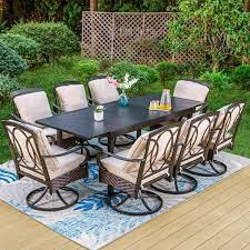 9 Piece Metal Outdoor Dining Set With Rectangular Carve Pattern Table And Rattan Swive Chairs With Beige Cushions