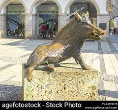 A Boar Statue With Bronze Tusk In