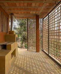 Serra House In A Facade Of Woven Bamboo