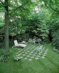 73 A Garden With Checd Pavement By