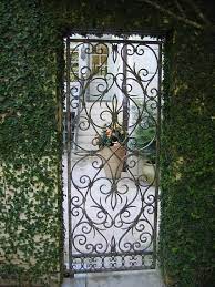 Wrought Iron Gate And Fig Ivy Covered