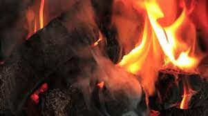Peat Logs Burning In Fire Ireland Gf