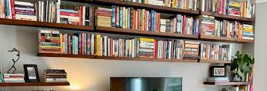 Massive Wall Of Floating Bookshelves