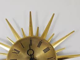 Golden Sunburst Brass Wall Clock