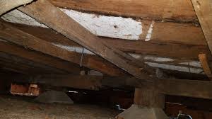 floor joist beneath a support post