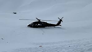 helicopter crashes into remote alaska lake