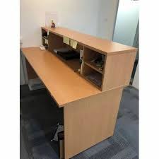 Brown Wooden Reception Table For Hotel