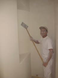 Skim Coating Smooths Over Rough Walls