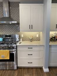 White Cabinets And Grey Hexagon Tile