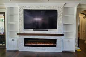 Wall Unit With Stone And Fireplace