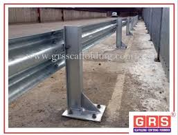 silver w metal beam crash barrier for